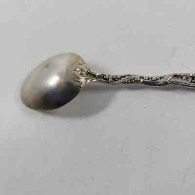 "Sterling" engraving on back of spoon handle