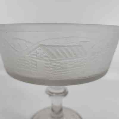 Log cabin molded on glass compote