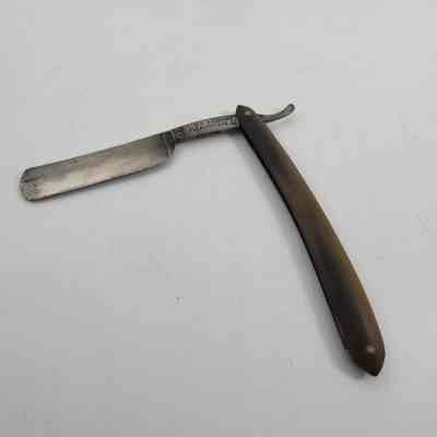 Reverse of open razor blade
