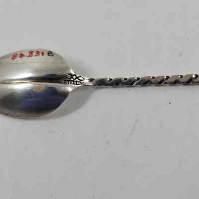 Engraving with "STERLING" on back of spoon