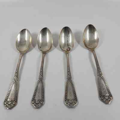 Set of four teaspoons with "SMD" monogrammed on handle