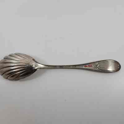 Back of silver serving spoon