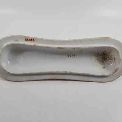 Bottom of soap dish lid