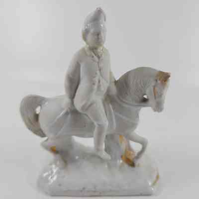 Front of man on horseback