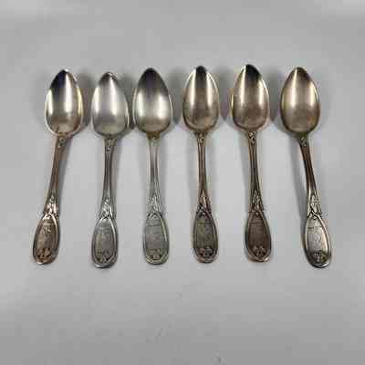 Set of six silver spoons with a squirrel engraved on the handle