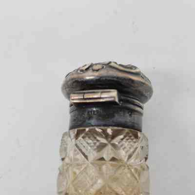 "Sterling" engraved on silver lid beneath the hinge