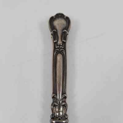 Scroll work design on handle
