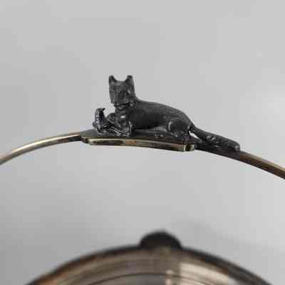 Fox with bird on the top of the handle