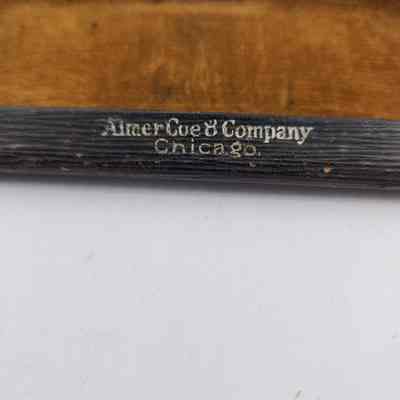 Inscription on inside of case "Almer Coe Company Chicago"