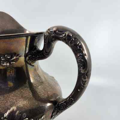 Silver Pitcher Handle