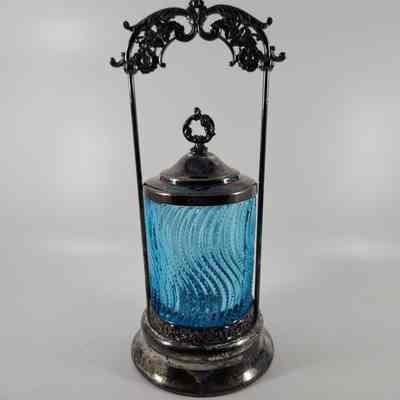 Blue glass tumbler paired with silver stand (2015.008 B) and lid (2015.008 C)