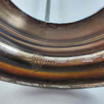 Engraved hallmark "Homan Silver Plate Co. Quadruple plate. Rope looped around the anchor. 1083