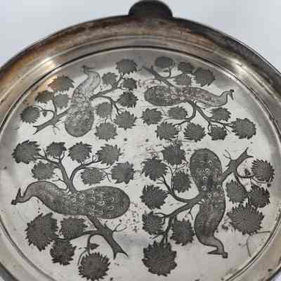 Tray with engraved peacocks on trees