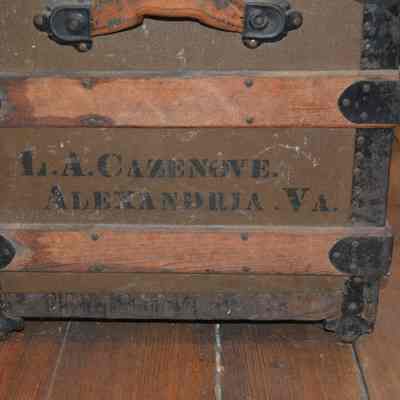 Side View: Left side of the clothes trunk. Note: "Alexandria, VA"- the city is back as a territory of Virginia and not DC