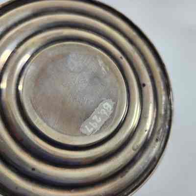 Engraving on bottom of candlestick "Wallace sterling cement filled reinforced 240."