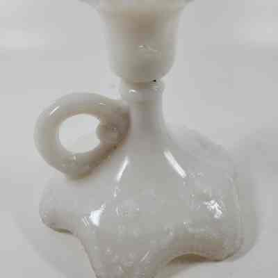 Side of white milk glass candlestick