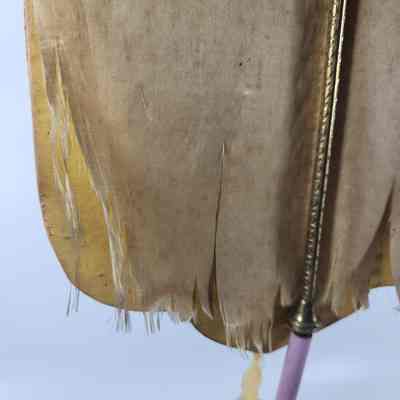 Bottom of candle screen frayed at seams
