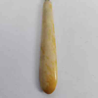 Imitation ivory handle