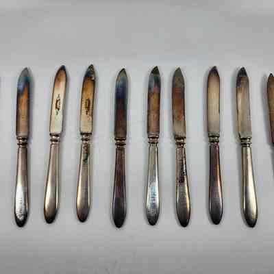 Set of ten silver fruit knives