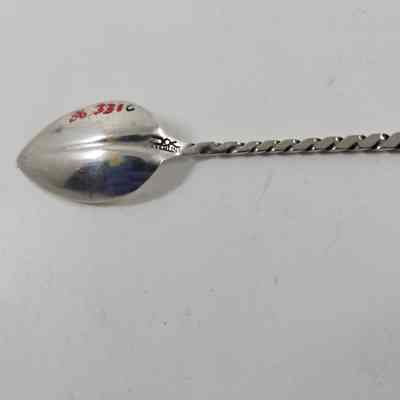 Engraving with "STERLING" on back of spoon