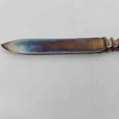 Blade of fruit knife showing discoloration