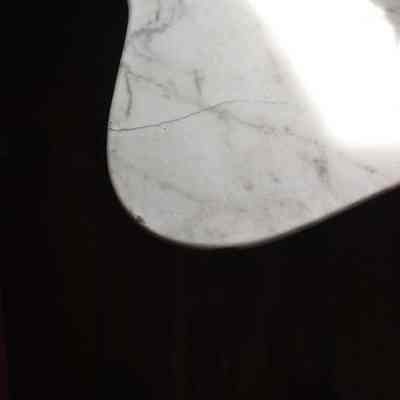 Cracked marble on lower left corner: Origformat: Artifact