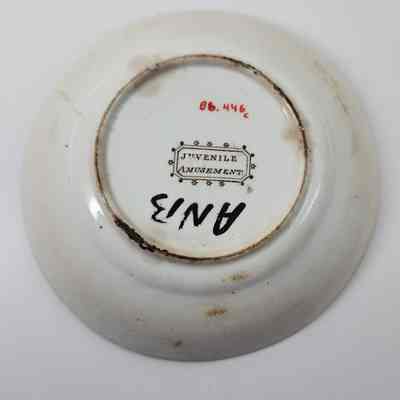 Bottom of plate with "Juvenile Amusement" and "ANB" written