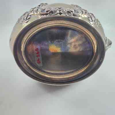 Silver Pitcher Bottom