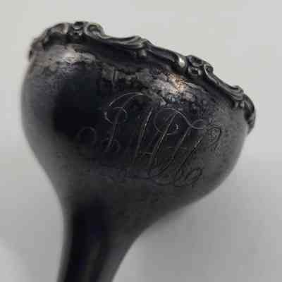 Monogram on funnel "LMH"