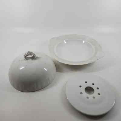Three pieces of white ceramic butter dish
