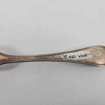 "Reed & Barton" engraving and accession number on back of the fork handle