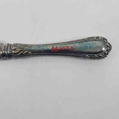 Back of handle showing discoloration and accession number - 98.107l