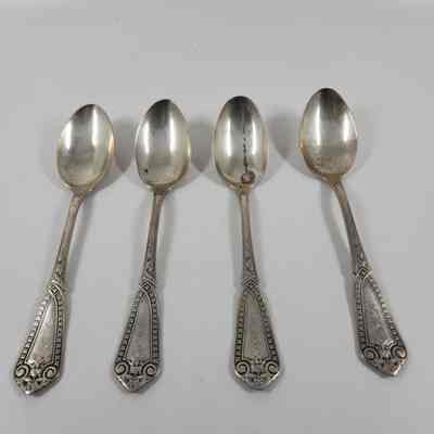 Set of four teaspoons with "SMD" monogrammed on handle