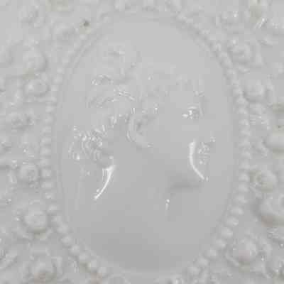 Woman's face embedded in tray