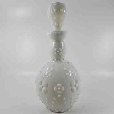 White milk glass bottle with floral pattern and stopper (2015.007 B)