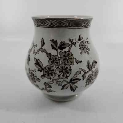 White sugar bowl with brown floral design