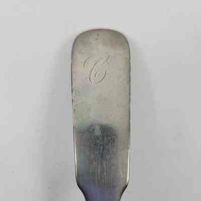 Monogramed "C" on front of handle