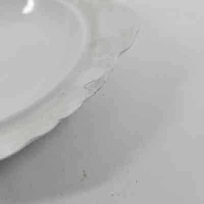 Chip on rim of butter dish