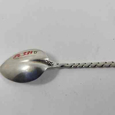 Engraving with "STERLING" on back of spoon