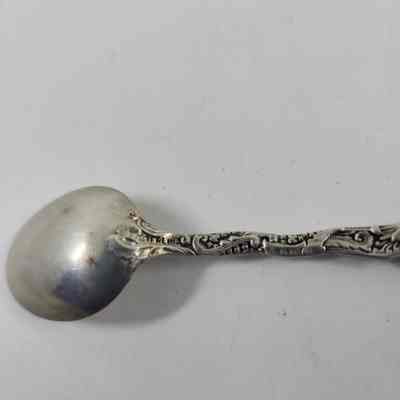 "Sterling" engraving on back of spoon handle