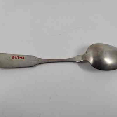 Back of silver serving spoon