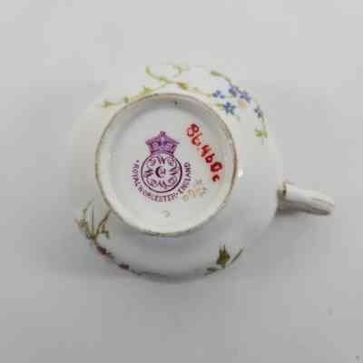 Bottom of teacup with makers mark "ROYAL WORCESTER ENGLAND"