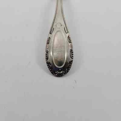 Handle of silver ladle