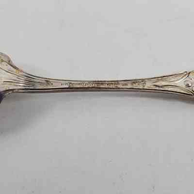 Engraving "GOULD, STOWELL & WARD PATENT 1850 11-12" on back of spoon handle