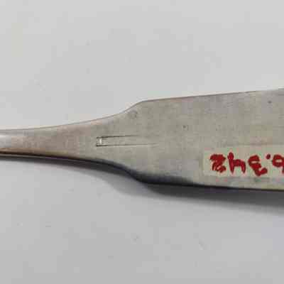 Engraving on back of spoon "E?"