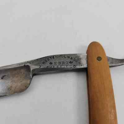 "J. WOSTENHOLM & SONS EBRO SHEFFIELD" engrave on blade
