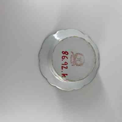 Manufacturer’s Mark: Located on underside