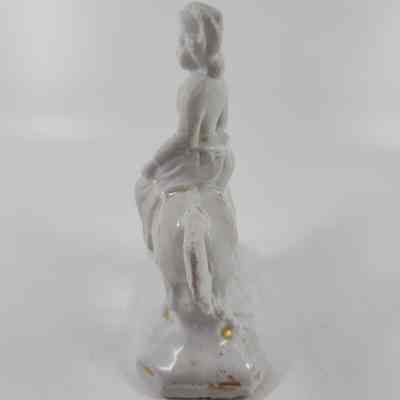Back of horse white figurine