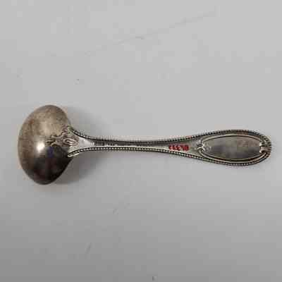 Back of silver ladle
