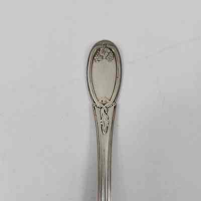 Engraving of grapes and vines on handle